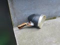Deadlight or lost lamp of a bicycle laying on the stairs of a house Royalty Free Stock Photo