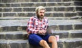 When deadline coming. Fresh air. Mobile internet. Agile business. Bearded guy sit stairs background. Work and relax Royalty Free Stock Photo