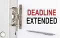 DEADLINE EXTENDED text on paper folder with pen. Business concept Royalty Free Stock Photo