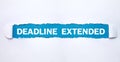 Deadline Extended text on torn paper Royalty Free Stock Photo