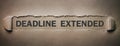 Deadline Extended text on torn paper Royalty Free Stock Photo