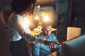 Deadlines wait for no one. two businesspeople working together on a computer in an office at night. Royalty Free Stock Photo