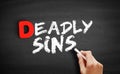 Deadly sins text on blackboard Royalty Free Stock Photo