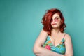 Deaf for arguments plus-size overweight lady in sunglasses and sundress with her arms crossed does not believe on mint