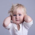 Deaf baby blue eyes blonde Royalty Free Stock Photo