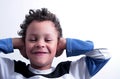 Deaf boy covering his ears stock photo Royalty Free Stock Photo