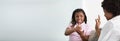 Deaf Mother Talking Sign Language With Her Daughter