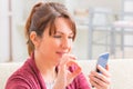 Deaf woman using sign language on the smartphone Royalty Free Stock Photo