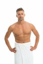 Deal with bristle. After bath. Sexy man in bath towel. Athletic guy with sexy muscular torso. Hygiene routine. Wellness Royalty Free Stock Photo