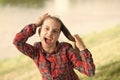 Deal with long hair on windy day. Windproof hairstyles. Girl little cute child enjoy walk on windy day nature background