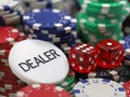 dealer chip with red dices on stacked poker chips, close up Royalty Free Stock Photo