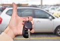 Dealer hand with a car key. Royalty Free Stock Photo