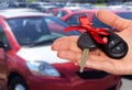 Dealer hand with a car key. Royalty Free Stock Photo