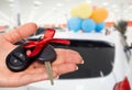 Dealer hand with a car key. Royalty Free Stock Photo