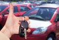 Dealer hand with a car key. Royalty Free Stock Photo