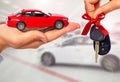 Dealer hand with a car key. Royalty Free Stock Photo