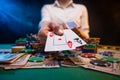 The dealer or player opens winning cards, two aces. A lot of money, chips, a casino and online gaming business. Poker, or black Royalty Free Stock Photo