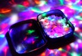 A box filled with ecstasy under disco lights. Royalty Free Stock Photo