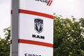 Dealership of RAM American cars with a logo on a panel