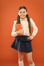 Dealing with school stress. Excellent first former. Girl child hold book. School girl studying textbook. Kid school Royalty Free Stock Photo
