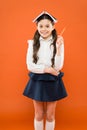 Dealing with school stress. Girl child hold book. School girl studying textbook. Kid school uniform hold book. Excited Royalty Free Stock Photo