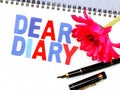 Dear diary word on white paper notebook Royalty Free Stock Photo