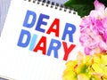 Dear diary word on white paper notebook Royalty Free Stock Photo