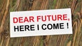 Dear future, I here come. Text inscription in the plate. Royalty Free Stock Photo