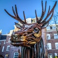 Dear from rusted metal elements. Famous sculptures of Amsterdam city centre.