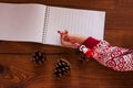 Dear Santa letter, child writes a Christmas card. Childhood dreams about gifts. New year concept Royalty Free Stock Photo