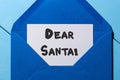 Dear Santa - letter to Santa Claus at blue envelope, decorated Christmas background Royalty Free Stock Photo