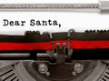 Dear Santa text by the typewriter on paper