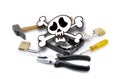 Death'head above hard disk opened with tools Royalty Free Stock Photo