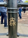 Royal cypher of HM the late Queen Elizabeth II (EIIR) on a post outside Buckingham Palace September 2022