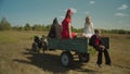 Death on tractor transporting souls to afterlife