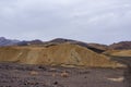 Death Valley - Man with scenic view Badlands of Zabriskie Point, Furnace creek, Death Valley National Park, California