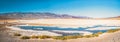 Panoramic view Badwater basin, Badwater flats, and mountains range in Death Valley National Park, CA