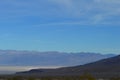 Death Valley Vista from entry point. Sloping hill foreground, mountain range and flloor in distance. Royalty Free Stock Photo