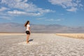 Death Valley - Woman looking at scenic view of Badwater Basin salt flats in Death Valley National Park, California, USA Royalty Free Stock Photo