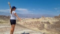 Death Valley - Woman with scenic view Badlands of Zabriskie Point, Furnace creek, Death Valley National Park, California