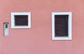 Deatil of a facade of a pink building Royalty Free Stock Photo
