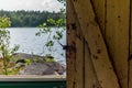 Deatil of an old wooden changing cabin on the shore of the Saimaa lake in Finland - 7