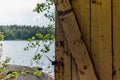 Deatil of an old wooden changing cabin on the shore of the Saimaa lake in Finland - 8