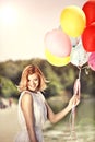 Deautiful girl with ballons