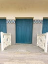 Deauville beach with wooden blue door locker rooms famous french resort in Normandy with the name of American star actor Royalty Free Stock Photo