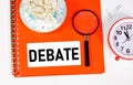 Debate. Text label in the folder. Disagreements on issues, conflict resolution. Royalty Free Stock Photo