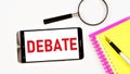 Debate. Text message on the smartphone screen. Disagreements on issues, conflict resolution.