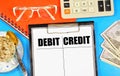 Debit and credit. Text label in the working document. Royalty Free Stock Photo