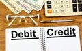 Debit credit. Text label in the working document. Royalty Free Stock Photo