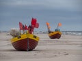 Debki beach, colorful fishing boats at the seashore. Poland